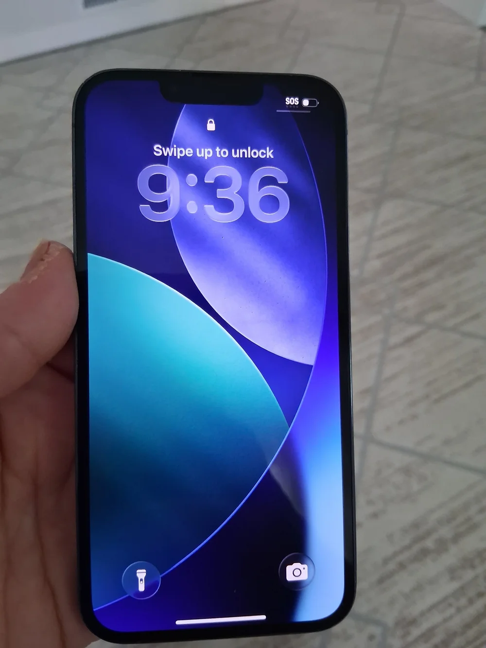 Apple Black Smartphone with Blue-Green Display